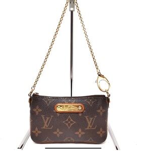 ( SOLD ) Louis Vuitton Milla PM Pochette
